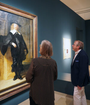 Curators Stephanie Dickey and Jochen Sander in front of the portrait of Andries de Graeff